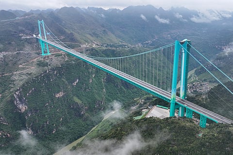 The Huajiang Grand Canyon Bridge, the world’s highest, is seen in China’s southwest Guizhou province on September 27, 2025.