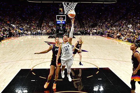 Kayla McBride #21 of the Minnesota Lynx drives to the basket during the game against the Phoenix Mercury during Round 2 Game 4 of the 2025 WNBA Playoffs on September 28, 2025 at PHX Arena in Phoenix, Arizona.