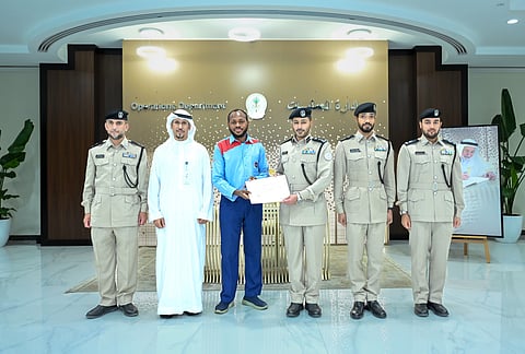Sharjah Police honour taxi driver for returning lost phone
