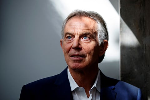 Former British Prime Minister Tony Blair poses for a photograph ahead of an interview with AFP in central London on July 17, 2018.