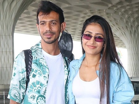 Yuzvendra Chahal (left) and Dhanashree Verma