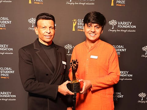 Sunny Varkey, Founder of the Varkey Foundation, and Adarsh Kumar, winner of the 2025 Chegg.org Global Student Prize.