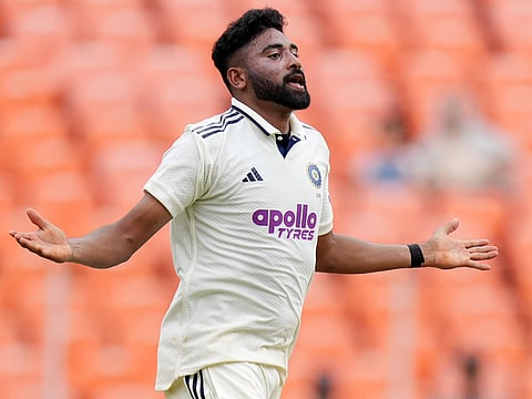 India's Mohammed Siraj celebrates the dismissal of West Indies' Alick Athanaze on the first day of the first Test at Narendra Modi Stadium in Ahmedabad, India, on Thursday, October 2, 2025.
