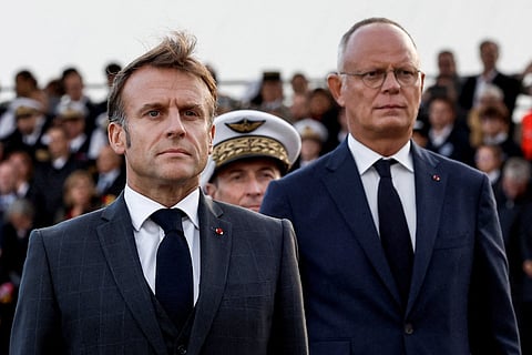 France's President Emmanuel Macron (L) and Mayor of Le Havre Edouard Philippe (R) attend a ceremony commemorating the 80th anniversary of the World War II liberation of the port city of Le Havre, northern France, on September 12, 2024.