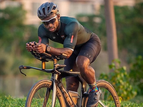 Dubai-based athlete Ghani Souleymane takes on challenge of 100 triathlons in 100 days to support children battling cancer.