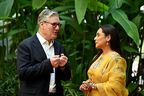 Britain's Prime Minister Keir Starmer meets Bollywood actress Rani Mukerji during a visit to Yash Raj Films, a Bollywood studio, in Mumbai on October 8, 2025.