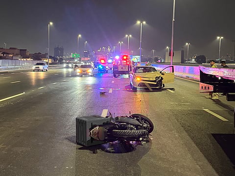 The motorcycle that was being driven in the direction opposite to the flow of traffic.