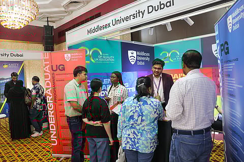 Families are busy interacting with universities on Sunday morning at Edufair
