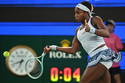 USA’s Coco Gauff hits a return to USA’s Jessica Pegula during the women’s singles final at the Wuhan Open tennis tournament in Wuhan, central China’s Hubei province on October 12, 2025.