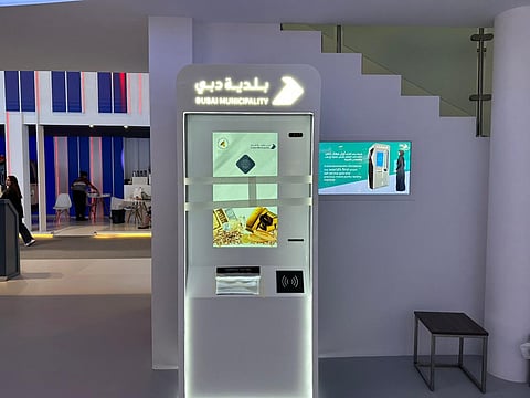 A prototype of the AI-enabled ATM-like kiosk on display at GITEX Global 2025 in Dubai on Monday