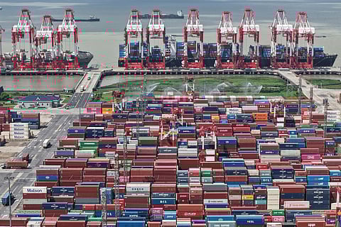 An aerial view of a container terminal in Shanghai, China Monday, October 13, 2025.