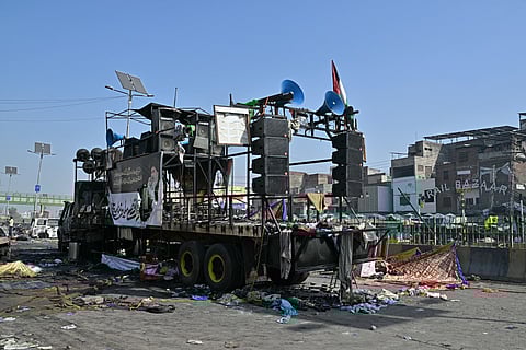 Remains of a charred container truck following violent clashes between police personnel and anti-Israel protesters from the Tehreek-e-Labbaik Pakistan (TLP) party in Muridke on October 13, 2025.