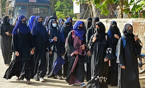 It’s not unusual to find students with headscarves in India.