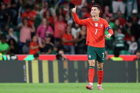 Portugal's forward Cristiano Ronaldo celebrates after scoring the equalising goal during the 2026 World Cup qualifiers Europe zone group F football match against Hungary at Jose Alvalade stadium in Lisbon on October 14, 2025.