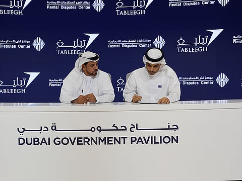 Mohammed Hamad Al Mahri from the RDC (right) and Humaid Obaid Humaid Al Mansoor are seen during the signing of partnership agreement