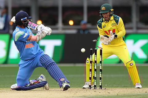 India's Washington Sundar is bowled by Australia's Matthew Kuhneman during the first one-day international cricket match in Perth on October 19, 2025.