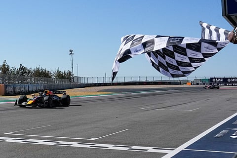Red Bull Racing's Dutch driver Max Verstappen crosses the finish line in first place as he wins the United States Formula One Grand Prix at the Circuit of the Americas in Austin, Texas, on October 19, 2025.