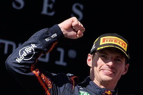 Red Bull driver Max Verstappen of the Netherlands celebrates on the podium after winning the Formula One U.S. Grand Prix auto race in Austin, Texas, Sunday, Oct. 19, 2025. (AP Photo/John Locher)