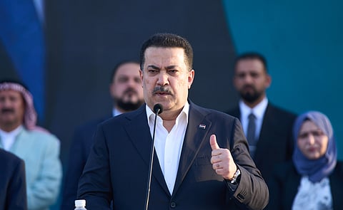 Iraqi Prime Minister Mohammed Shia Al Sudani speaks at his political block campaign rally before the parliamentary elections in Mosul, Iraq, Saturday, Oct. 18, 2025.