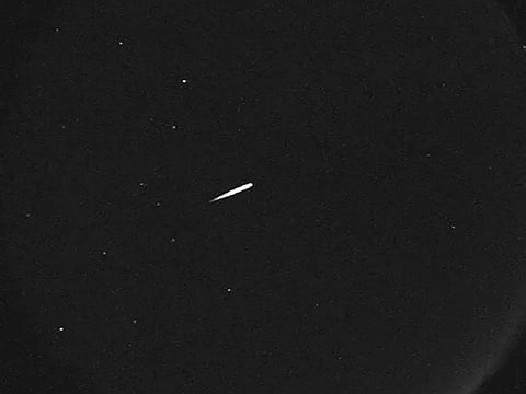 This photo provided by NASA shows a meteor from the Orionid shower on Oct. 13, 2015.