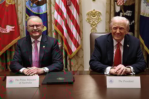 Prime Minister of Australia Anthony Albanese (L) and U.S. President Donald Trump speak to reporters after signing a $8.5 billion rare earth minerals agreement during a bilateral meeting in the Cabinet Room of the White House on October 20, 2025 in Washington, DC. Albanese is visiting the U.S. Capital to meet with President Trump and later visit the Pentagon.