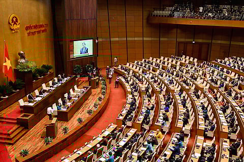 Vietnam's Members of Parliament attend the autumn opening session at the the National Assembly in Hanoi. File photo taken October 20, 2025.