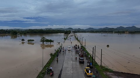 Rising floodwaters submerged part of a road and ricefields in Agkilo, Panitan, Capiz following torrential rains brought by Typhoon Ramil, based on a drone shot taken by YouScooper Dodong Farming Vlog. The road in Panitan, Capiz City remained impassable on Sunday, according to the Department of Public Works and Highwahys (DPWH) Region 6.