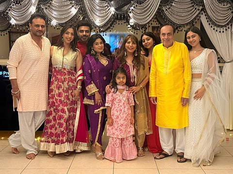 The family of Ajay Mohanlal Ramchandani (third from left) celebrating Diwali at home on Monday.