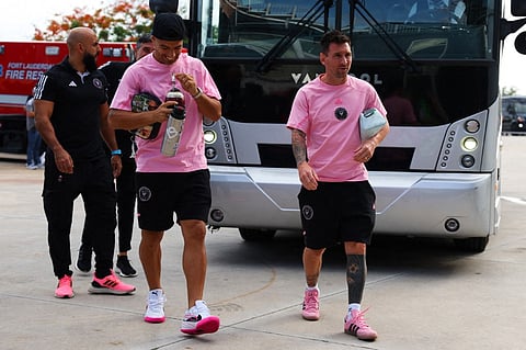 Luis Suárez and Lionel Messi of Inter Miami arrive prior to a game against St. Louis City at Chase Stadium.