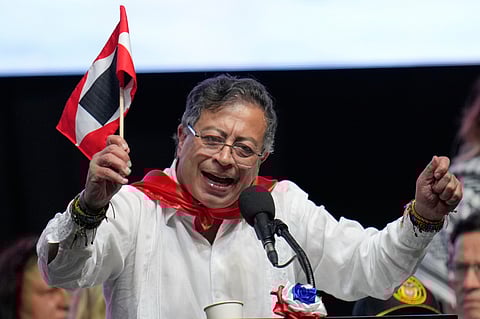 Colombian President Gustavo Petro addresses supporters during a rally in Ibague, Colombia, Friday, Oct. 3, 2025. (AP Photo/ Fernando Vergara)