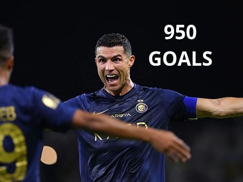 Nassr's Portuguese forward #07 Cristiano Ronaldo (R) celebrates with Nassr's Saudi midfielder #29 Abdulrahman Ghareeb after scoring a goal during the Saudi Pro League football match between Al-Nassr and Al-Hazem at the King Abdullah Sports City in Buraidah, on September 2, 2023.
