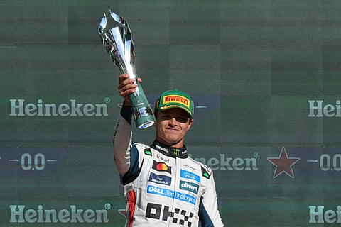 McLaren driver Lando Norris of Britain celebrates after winning the Formula One Mexico Grand Prix in Mexico City, Sunday, Oct. 26, 2025.