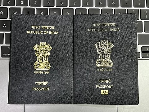 A combo pic showing the existing regular passport on the left and the new ePassport with RFID chip and antenna embedded in it. The ePassport features a gold-colour symbol for the chip.