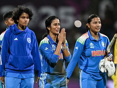 India's Jemimah Rodrigues (C) gestures as she celebrates the team's win at the end of the ICC Women's Cricket World Cup 2025 one-day international (ODI) semi-final match between India and Australia.