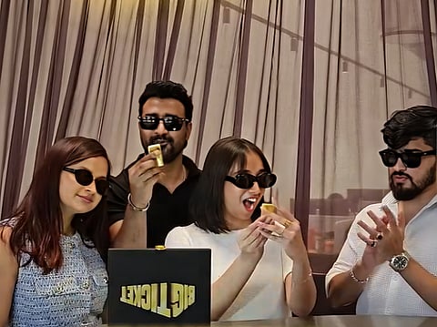 Screen grab taken from a Big Ticket promotional video on weekly draws featuring gold bars as prizes.