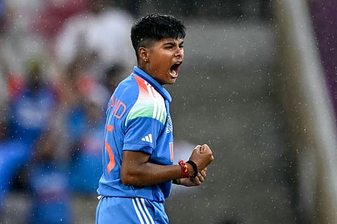 India's Kranti Goud celebrates after taking the wicket of Australia's captain Alyssa Healy during the ICC Women's Cricket World Cup 2025 one-day international (ODI) semi-final match between India and Australia at the DY Patil Stadium in Navi Mumbai on October 30, 2025.