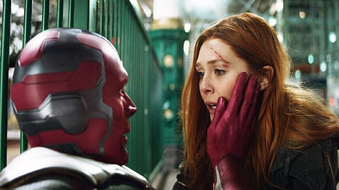 Elizabeth Olsen as Scarlet Witch, and Paul Bettany as Vision in Avengers Infinity War.