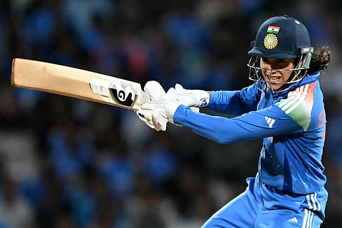 India's Smriti Mandhana plays a shot during the ICC Women's Cricket World Cup 2025 one-day international (ODI) final match between India and South Africa at the DY Patil Stadium in Navi Mumbai on November 2, 2025.