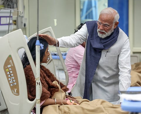 Prime Minister Narendra Modi meets the injured in the Red Fort car blast, at Lok Nayak Hospital in Delhi on Wednesday.