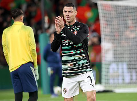 Portugal's forward Cristiano Ronaldo warms up ahead of during the men's football 2026 World Cup Group F qualifier between Ireland and Portugal at Aviva Stadium in Dublin on November 13, 2025.