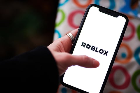 The Roblox logo on a smartphone arranged in New York, US, on Tuesday, Nov. 7, 2023.