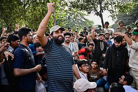People celebrate the court's verdict after Bangladesh's former Prime Minister Sheikh Hasina was found guilty and sentenced to death in Dhaka on November 17, 2025.