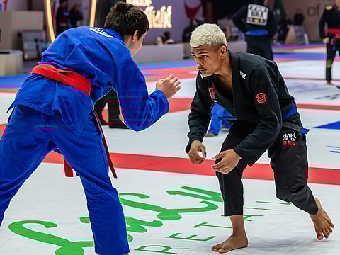 Brazilian teenager sells candies, peanuts to chase jiu-jitsu dream