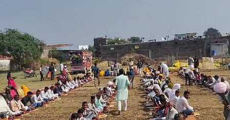 Villagers attend a monkey’s funeral feast in Madhya Pradesh, India.
