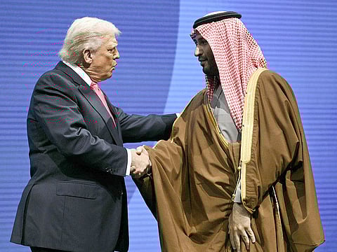 US President Donald Trump shakes hands with Crown Prince and Prime Minister of the Kingdom of Saudi Arabia Mohammed bin Salman at the US-Saudi Investment Forum at the John F. Kennedy Center for the Performing Arts in Washington, DC on November 19, 2025.
