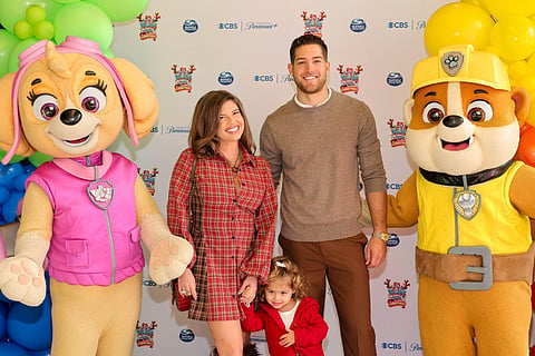 Chanel West Coast, Dom Fenison, and their daughter Bowie at the PAW Patrol Christmas Special Advance Screening at Nickelodeon in Burbank on November 22, 2025 in Burbank, California.