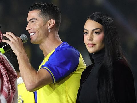 Georgina Rodriguez (right) with her partner and football icon Cristiano Ronaldo