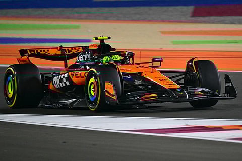 McLaren's British driver Lando Norris drives during the Formula One Qatar Grand Prix at the Lusail International Circuit in Lusail on November 30, 2025.