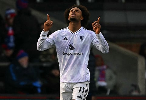 Manchester United's Dutch forward Joshua Zirkzee celebrates scoring the equalising goal during the English Premier League football match against Crystal Palace at Selhurst Park in south London on November 30, 2025.