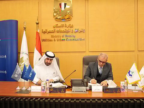 Sheikh Dr Majid Bin Saeed Al Nuaimi, and Eng. Ahmed Ali Mohamed Hassan during the signing ceremony to launch a new development project in new Cairo.